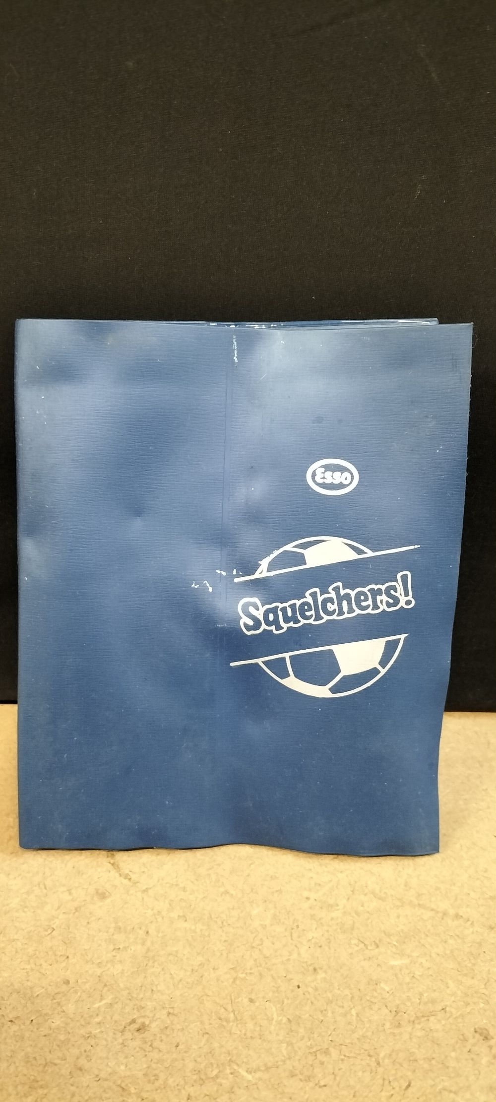 Lot 331: A Collection of 15 Vintage Esso Squelchers Football Booklets in a Blue Vinyl Album