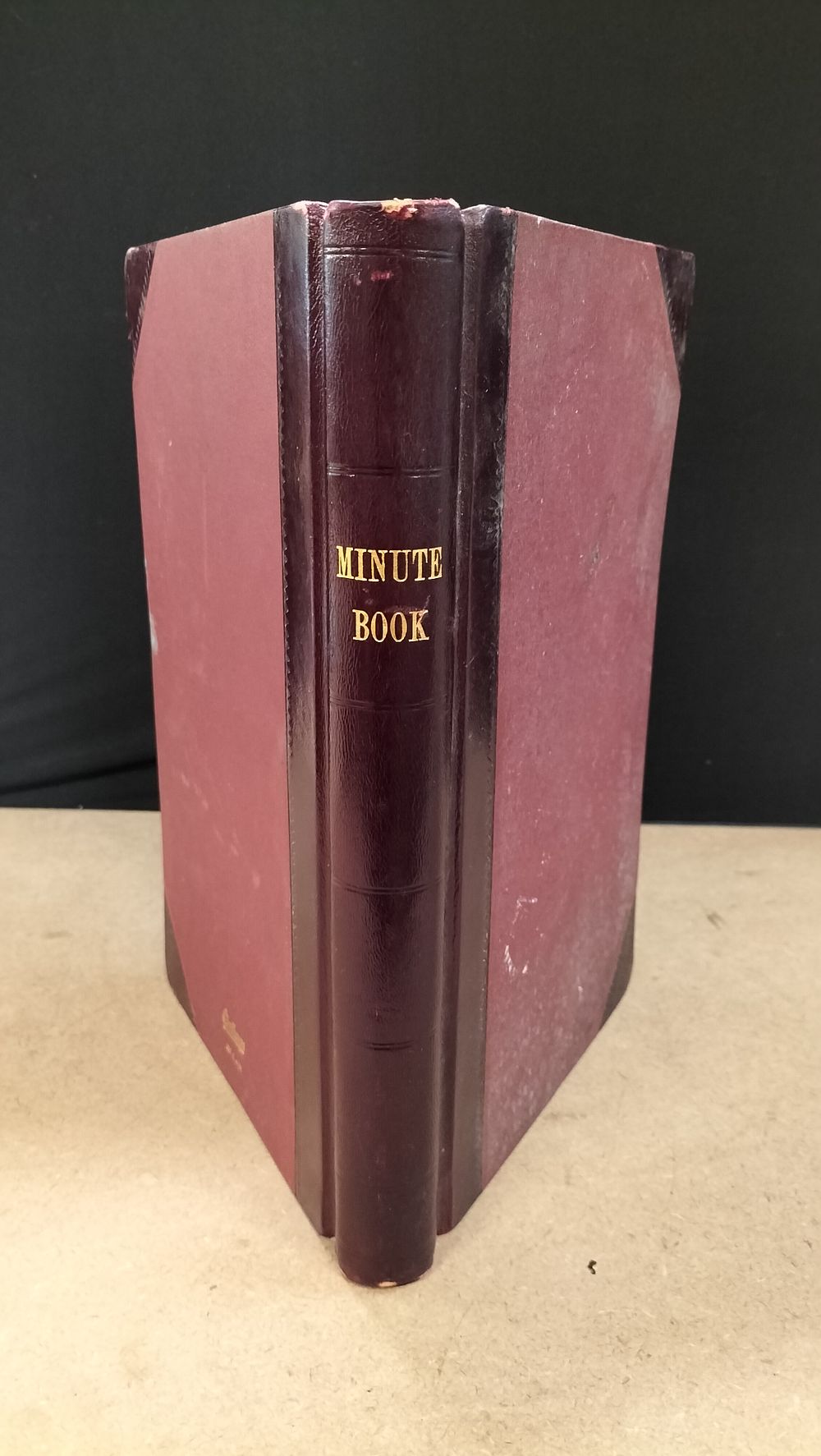 Lot 363: A Vintage Half Bound Faux Leather and Paper Minute Book