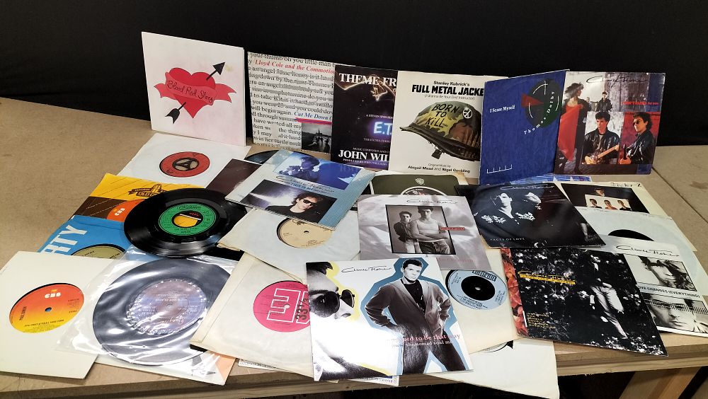 Lot 369: A Collection of Approximately 21 Pop and Rock 7-Inch Vinyl Singles