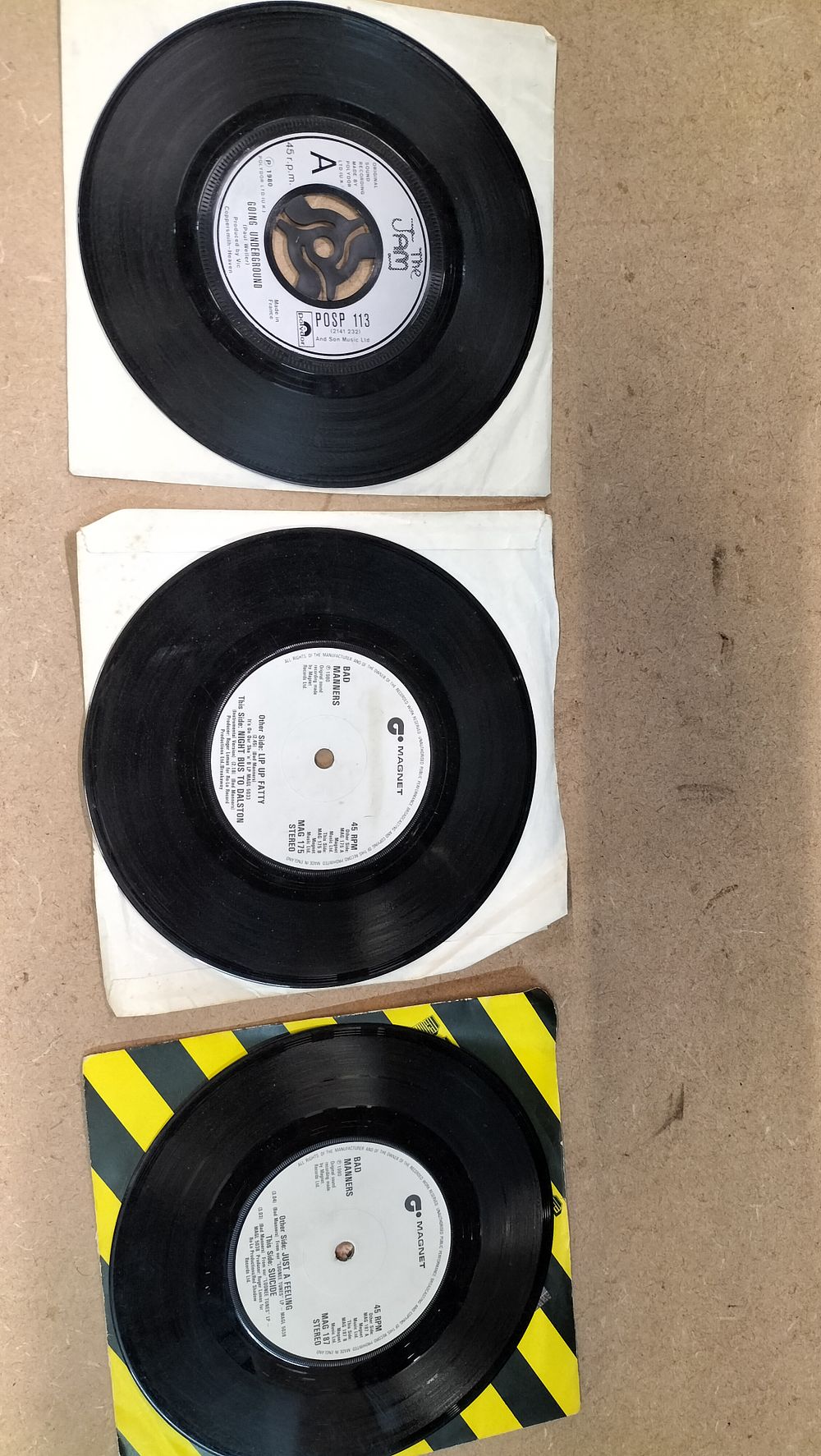 Lot 370: 3 Vinyl 7-inch Singles by The Jam and Bad Manners