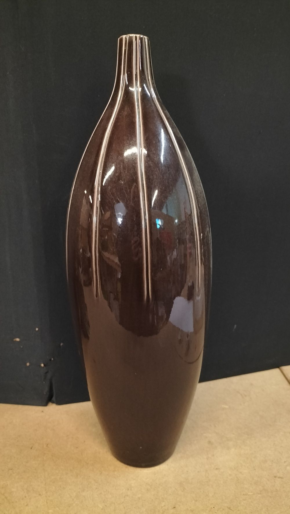 Lot 382: A Brown Glazed Ceramic Vase, 301.184.95