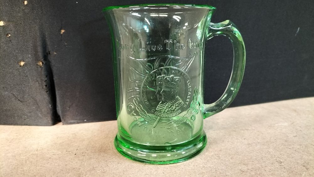 Lot 19: A Green Pressed Glass 1937 Coronation Commemorative Mug