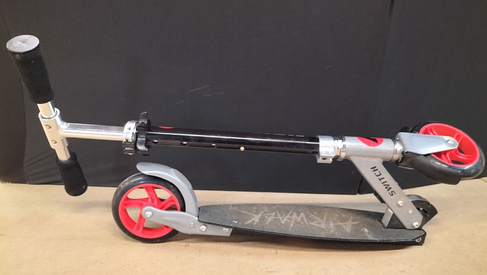 Lot 36: An Airwalk Switch Folding Metal Kick Scooter