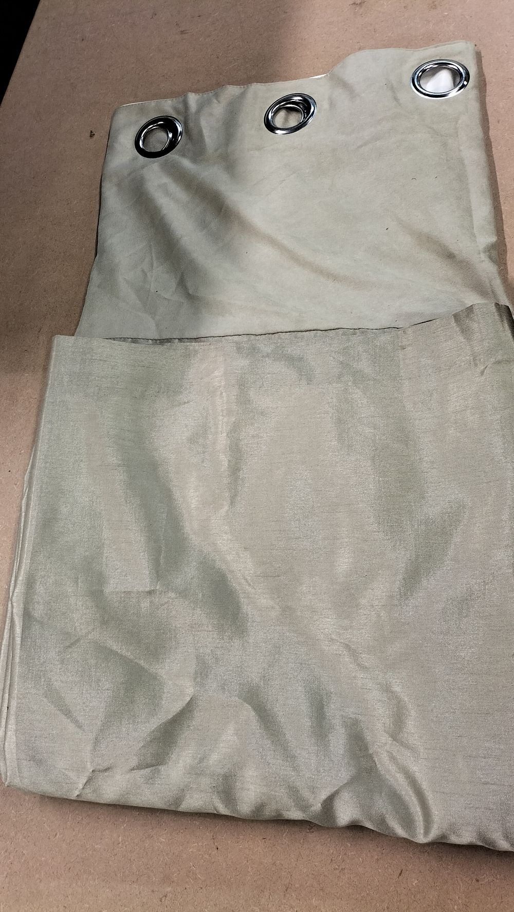 Lot 44: A Pair of Moss Green Lined Faux Silk and Microsuede Eyelet Curtains