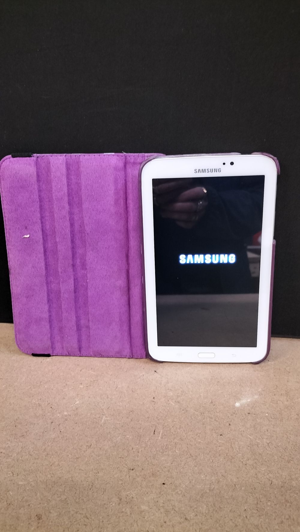 Lot 54: A Samsung Galaxy Tab 3 SM-T210 8GB Tablet in White with Folio Case