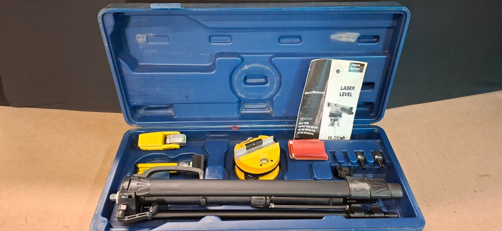 Lot 25: A Composite Laser Level Set including a Stanley XP180 Cross Line and Laser Plumb