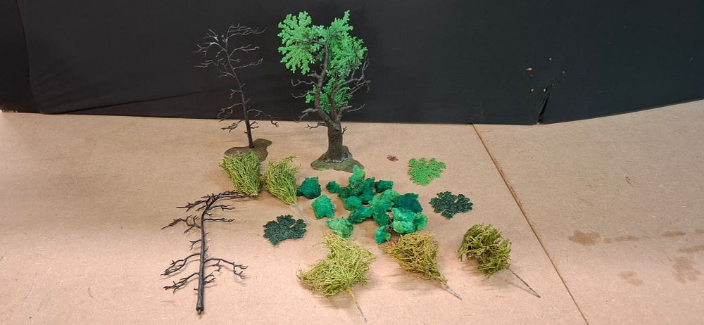 Lot 60: An Assortment of 18 Model Scenery Trees and Foliage Components