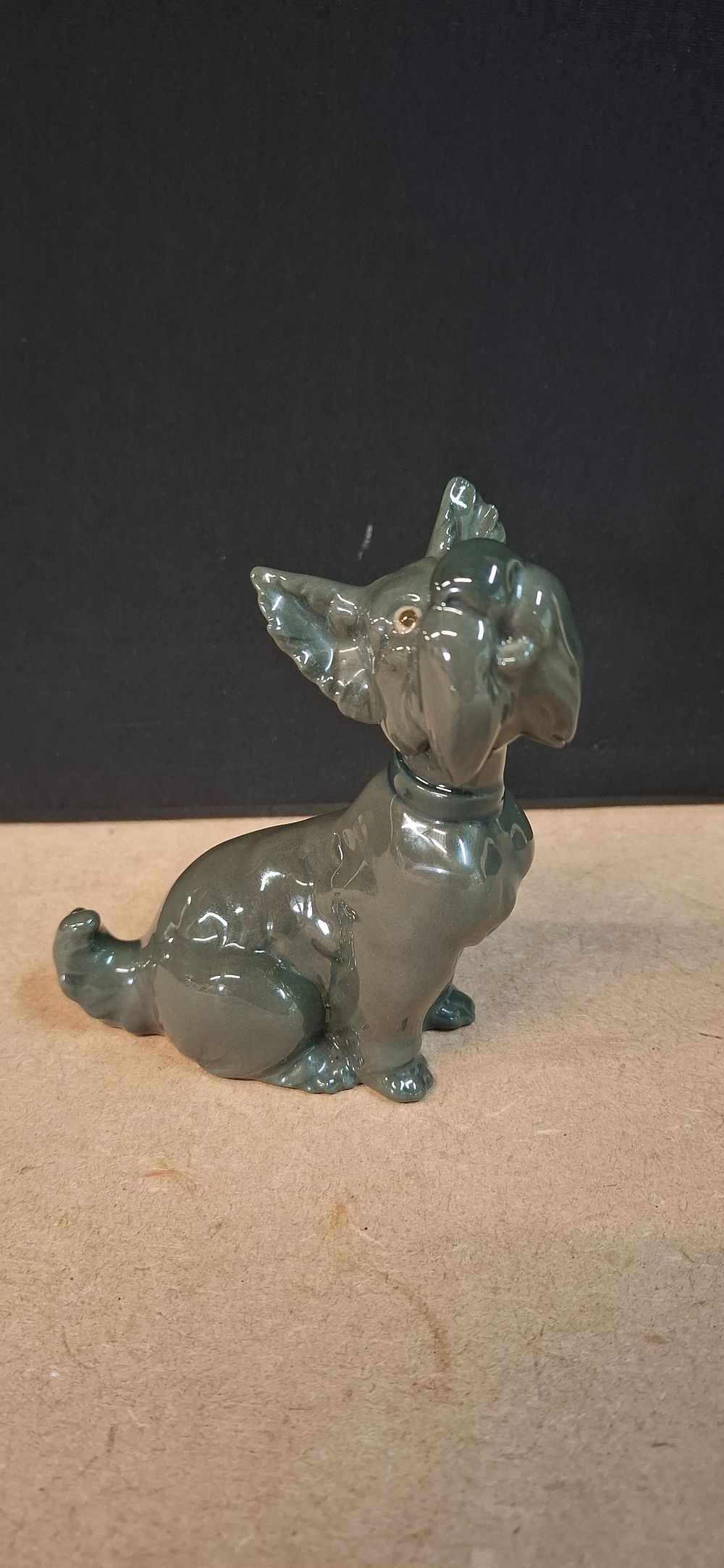 Lot 80: A Nao by Lladro Glazed Ceramic Scottish Terrier Figurine