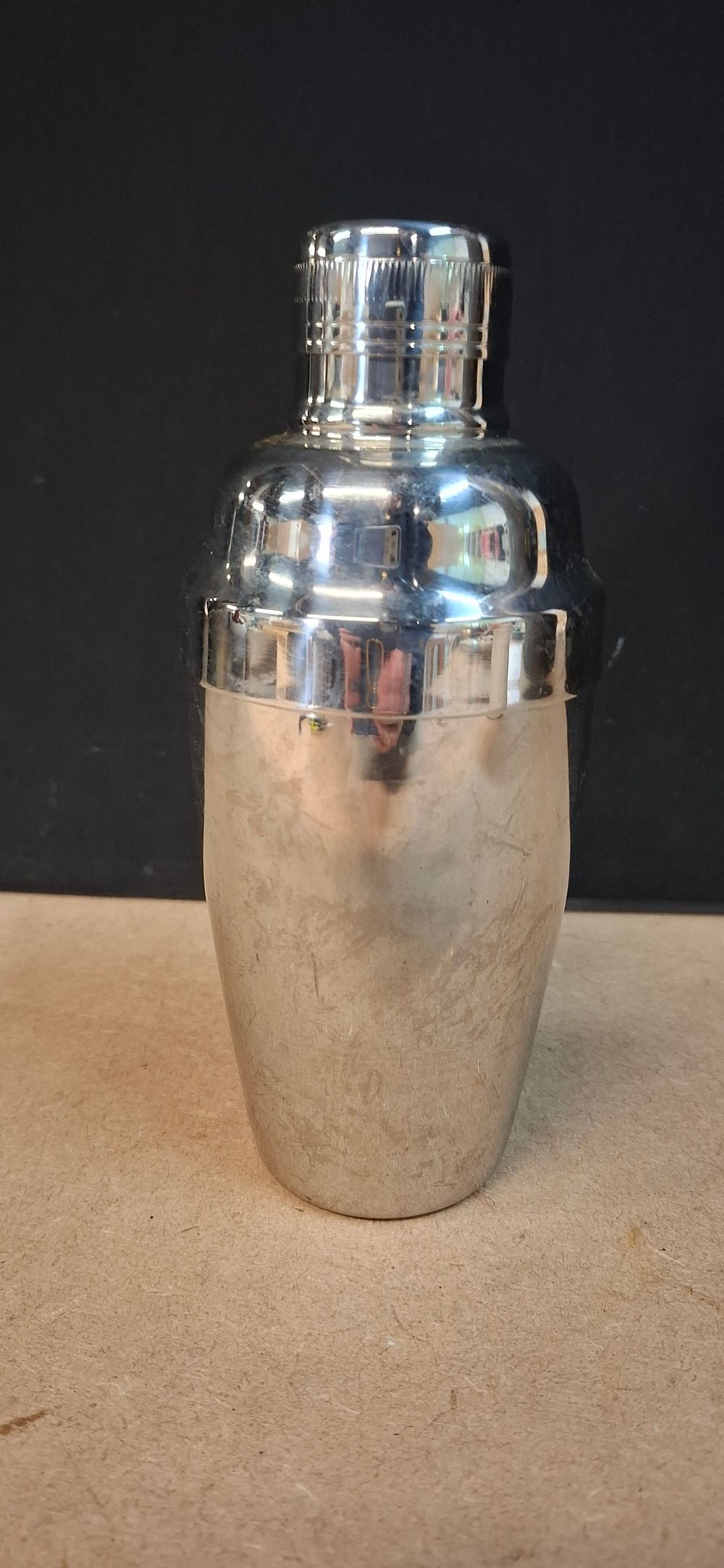 Lot 85: A Three-Piece Stainless Steel Cocktail Shaker