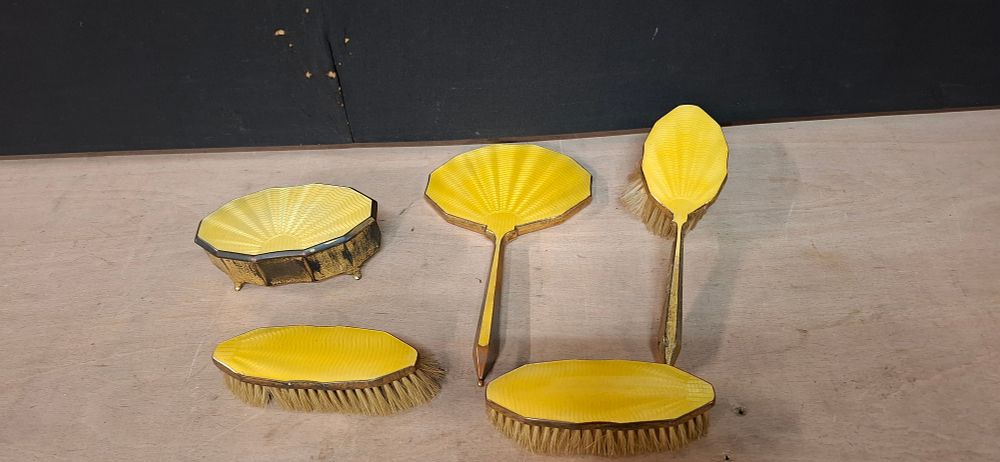 Lot 109: A Collection of Yellow Guilloché Enamel and Gilt Metal Dressing Table Items