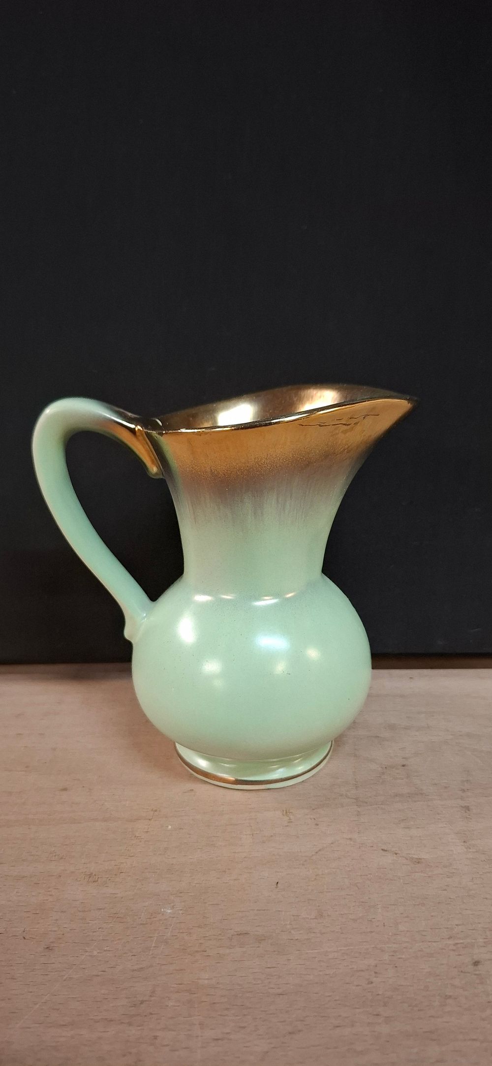 Lot 110: A German Ceramic Pitcher With Gold Lustre Glaze