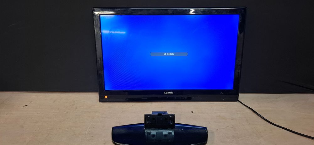 Lot 126: A Luxor LCD TV DVD Combi with Pedestal Stand