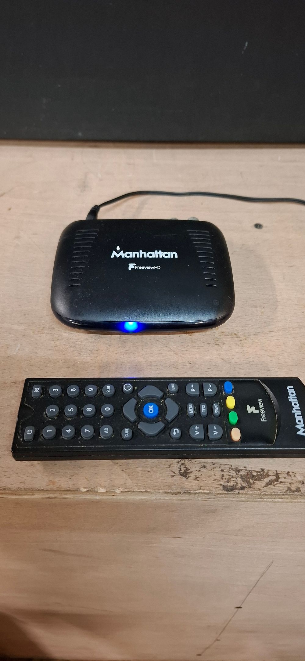 Lot 127: A Manhattan T1 Freeview HD Receiver with Remote Control and HDMI Cable