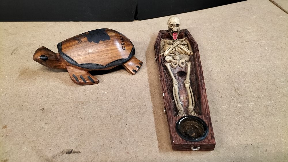 Lot 301: A Hardwood Turtle Carving and a Composite Skeleton in Coffin Incense Burner