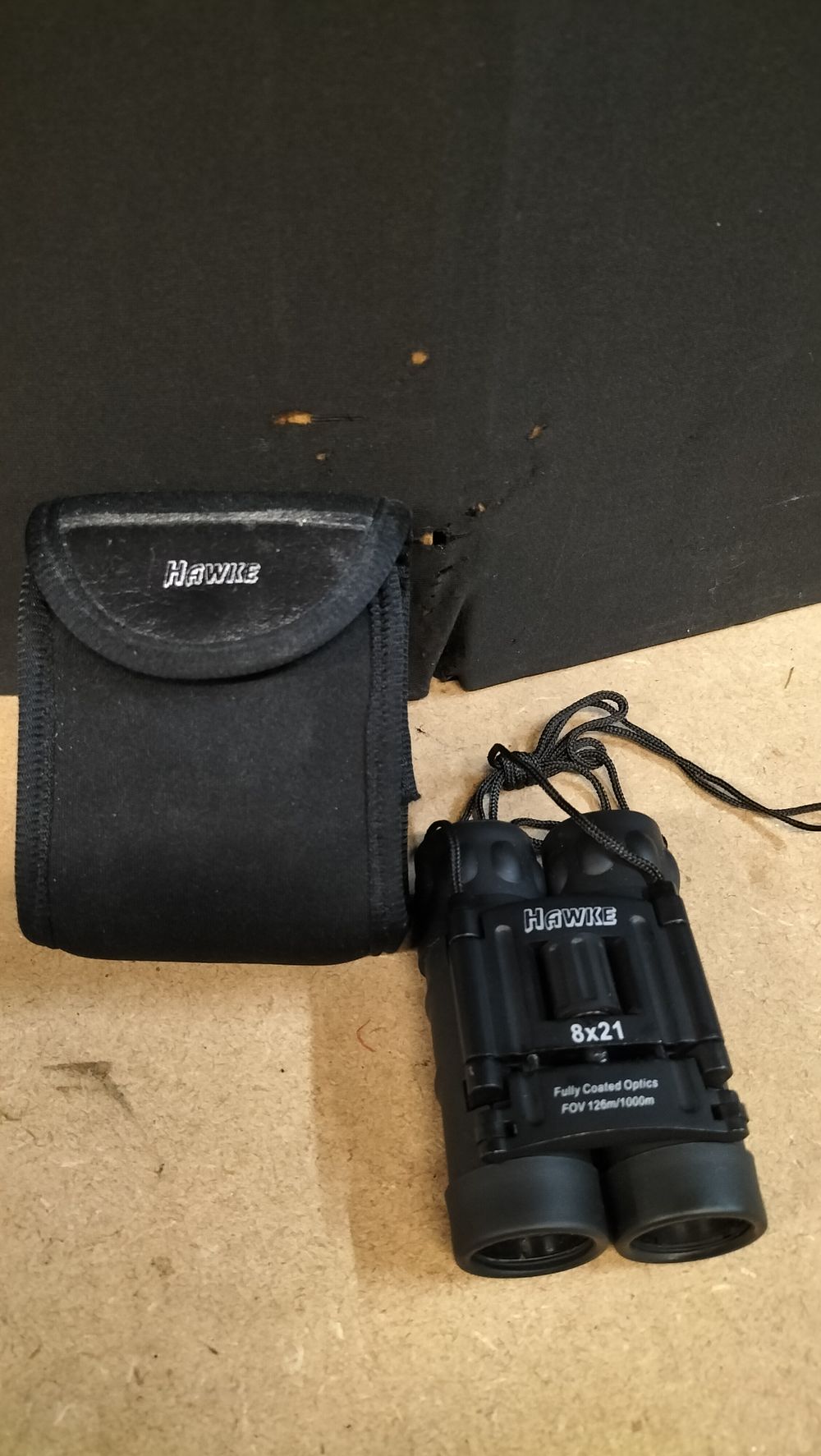 Lot 303: A Hawke 8x21 Compact Binocular with Matching Soft Case