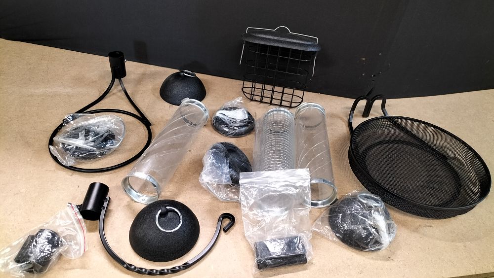Lot 310: A Collection of Black Metal and Plastic Bird Feeding Station Components