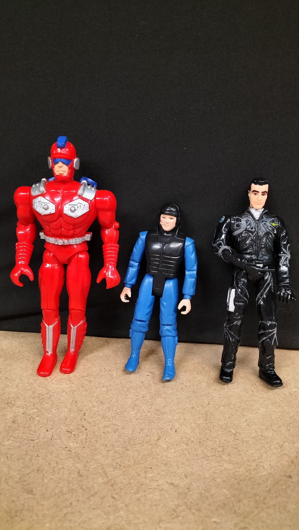 Lot 317: 3 Plastic Action Figures including 1994 Orion and 1997 New Line Productions