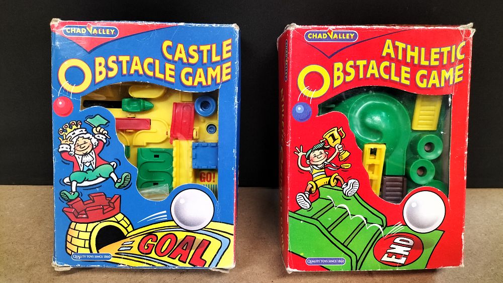 Lot 331: A Pair of Chad Valley Plastic Castle and Athletic Obstacle Games