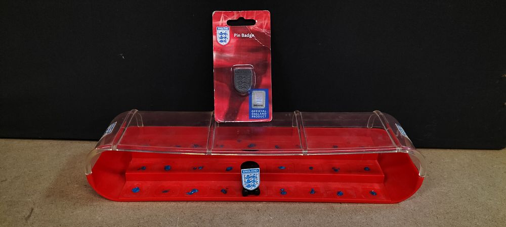 Lot 352: Three Piece Official England Football Team Pin Badge and Storage Case for Crazy Bones Figures