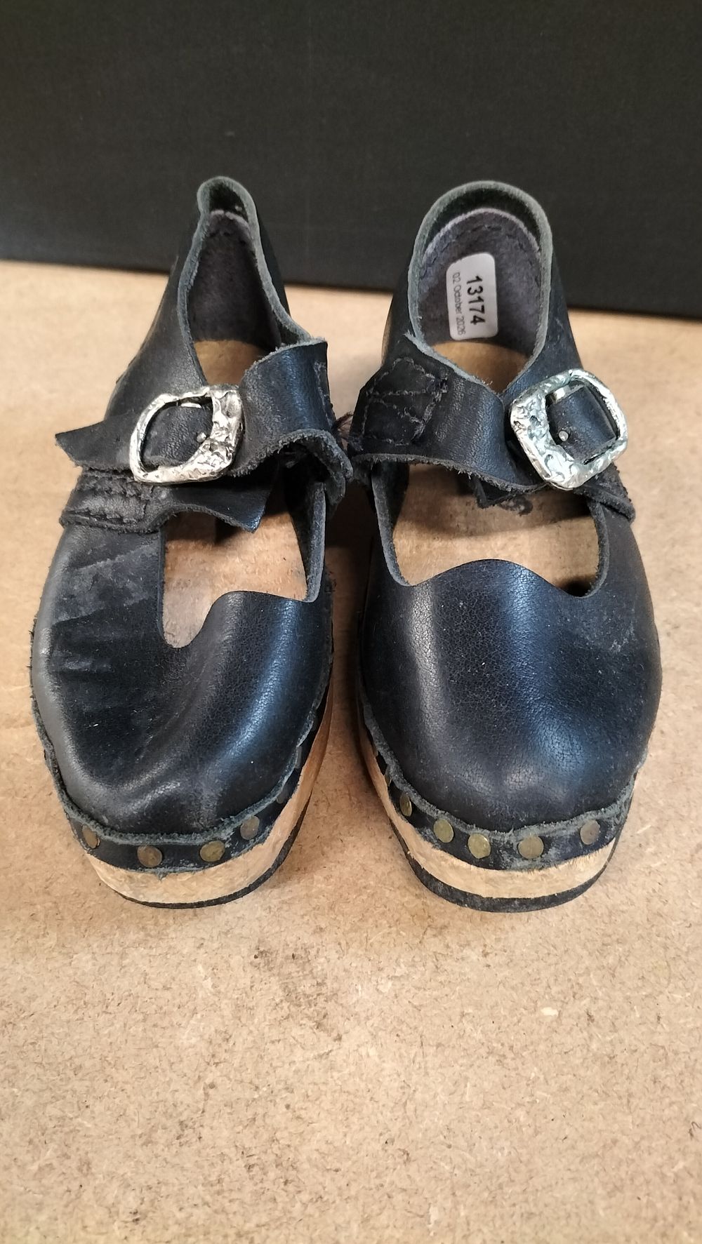 Lot 384: A Pair of Black Leather Wooden Mary Jane Clogs Size 6