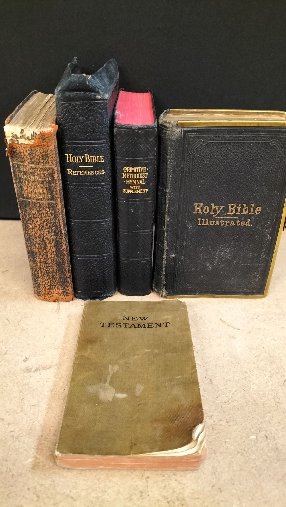 Lot 385: A Collection of Leather and Cloth Bound Religious Volumes including Oxford Holy Bible