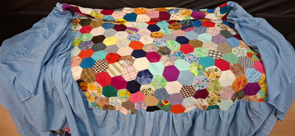 Lot 155: A Multi-Piece Hand Made Patchwork Hexagon Quilt Bed Spread  Size Single