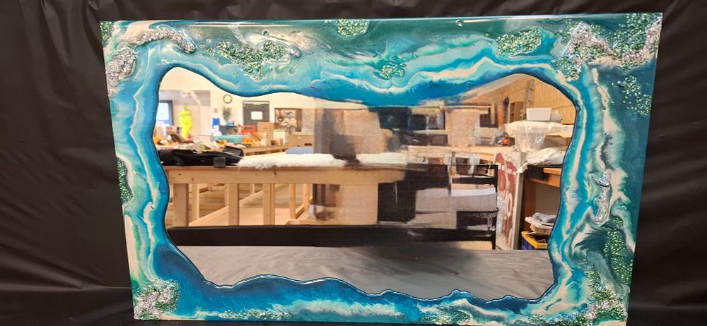 Lot 194: A Resin and Mixed Media Geode Style Wall Mirror