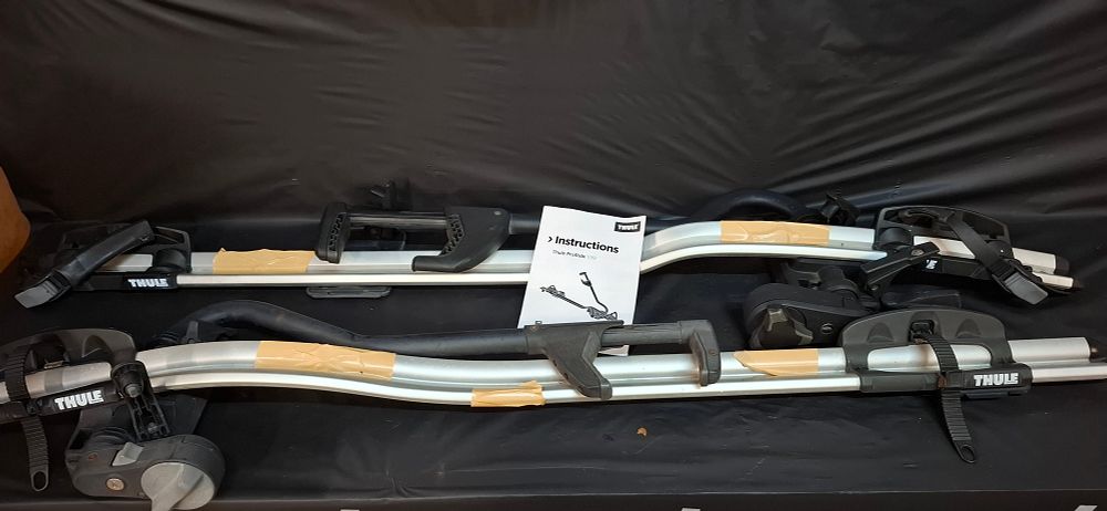 Lot 205: 2 Thule ProRide 598 Aluminium Roof Mounted Upright Bicycle Racks. COLLECTION ONLY