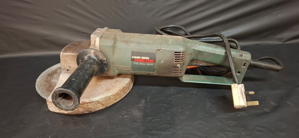 Lot 211: A Black & Decker Proline PL85 230mm 1800W Angle Grinder. Tested for Power