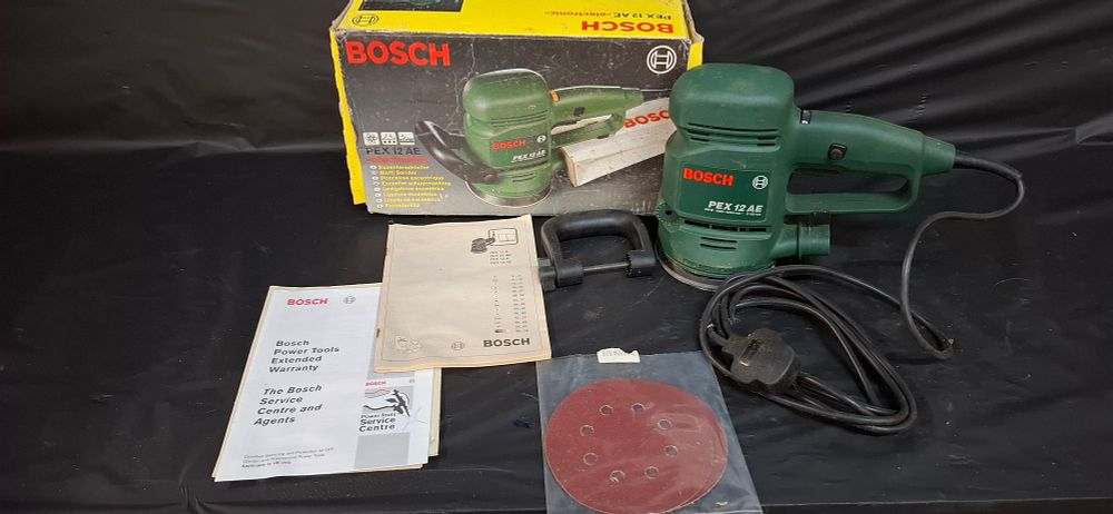 Lot 212: Bosch PEX 12 AE Electronic Random Orbit Sander with Original Box.  Tested  for Power