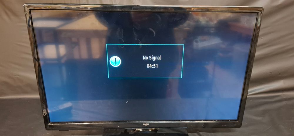 Lot 215: Bush LED24265DVDCNTD 24-Inch LED Smart Television with Integrated DVD Player. Tested for Power