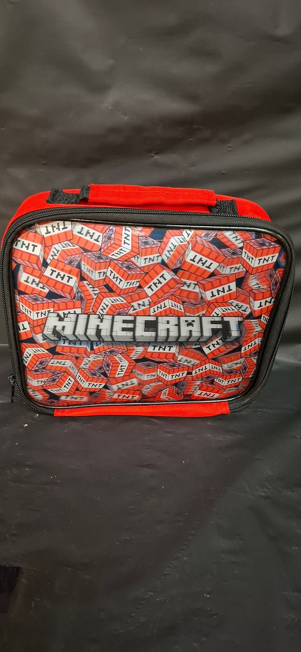 Lot 230: A Zak! Designs Minecraft TNT Insulated Lunch Bag
