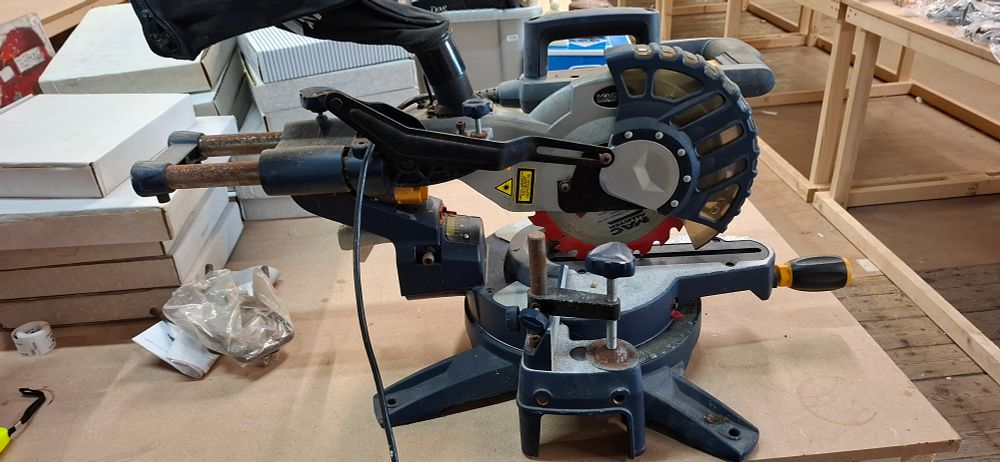 Lot 245: MacAllister COD211LSM 1400W Sliding Mitre Saw