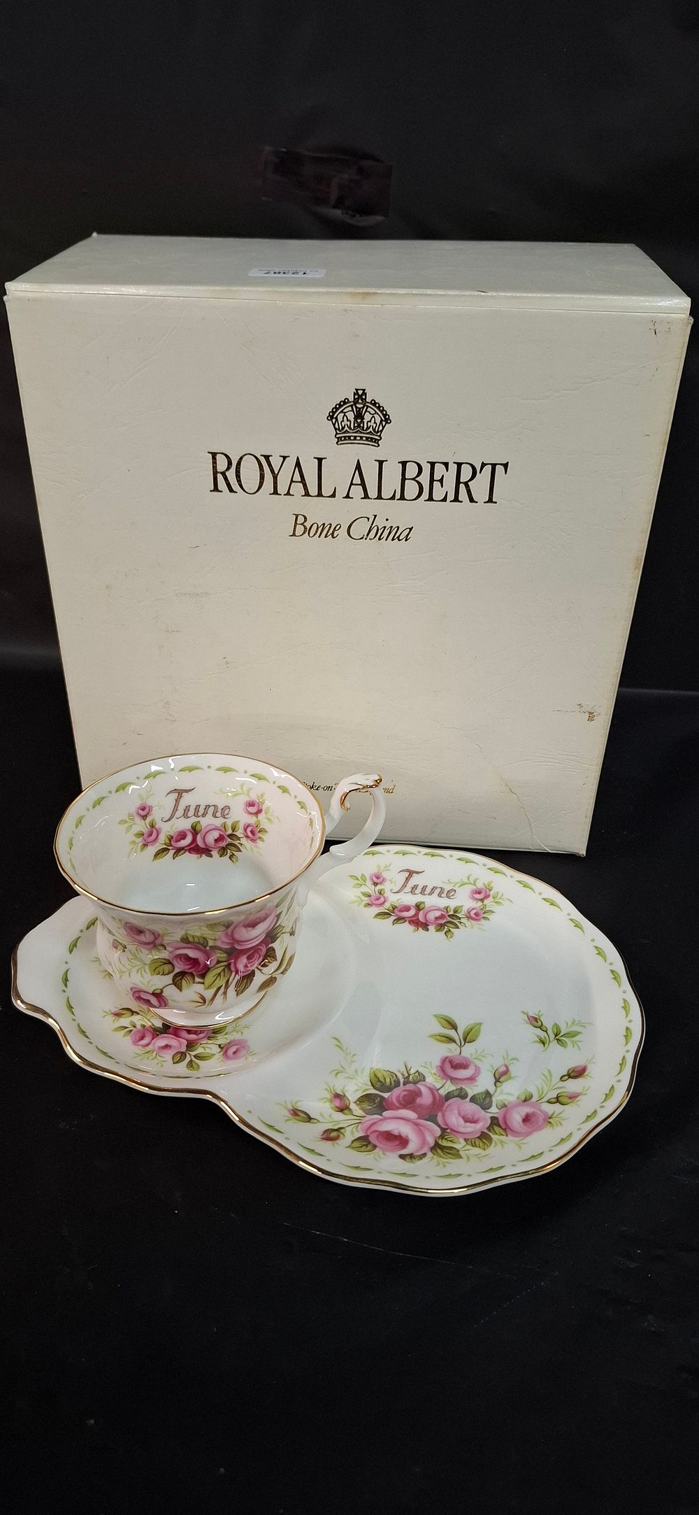 Lot 260: A Royal Albert Bone China Flower of the Month Series June Roses Tennis Set