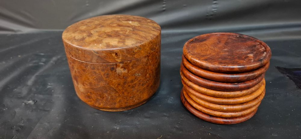 Lot 264: A Set of Burl Wood Coasters and Storage Canister