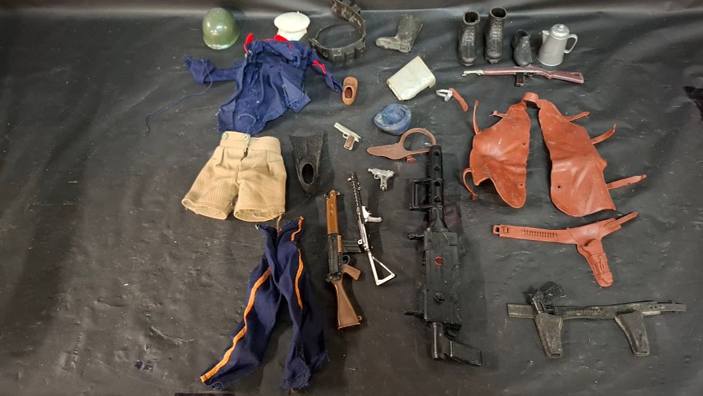 Lot 292: An Assortment of 1/6 Scale Action Figure Accessories and Clothing