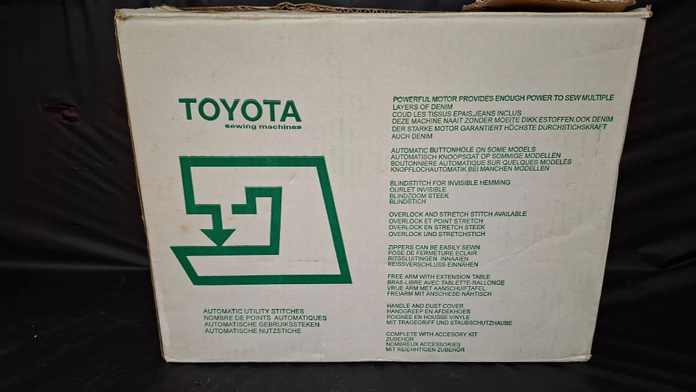 Lot 390: A Toyota Electronic Control Series Electric Sewing Machine with Accessories