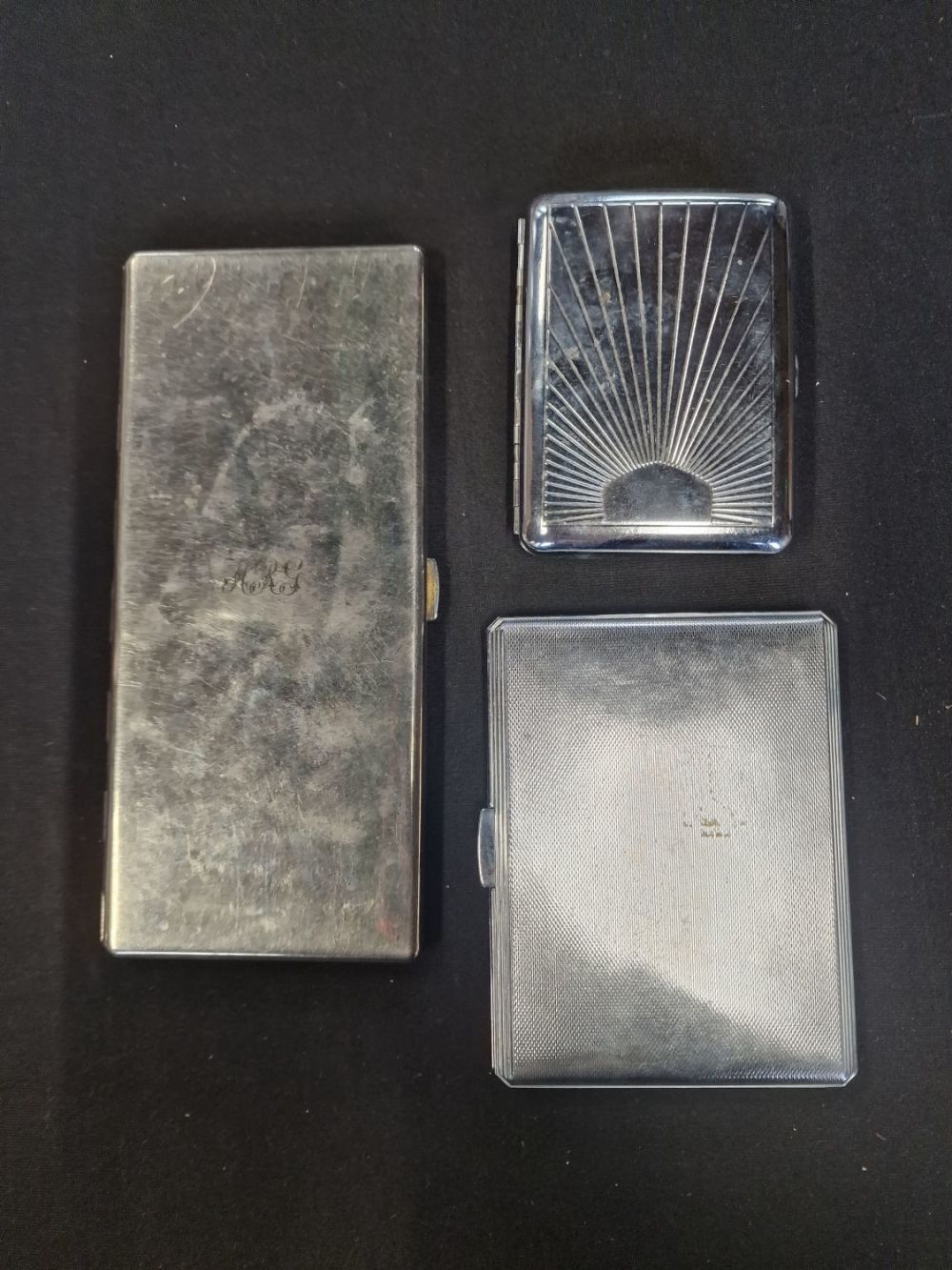Lot 213: Three vintage cigarette cases
