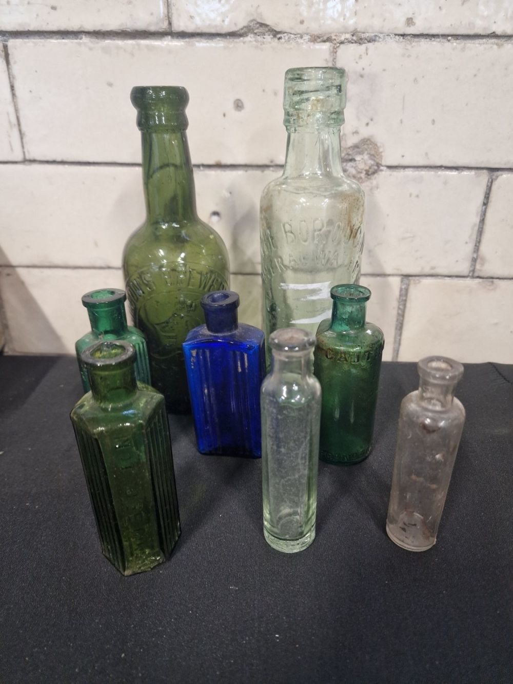 Lot 280: Eight vintage medicine, poison and brewery bottles, includes...