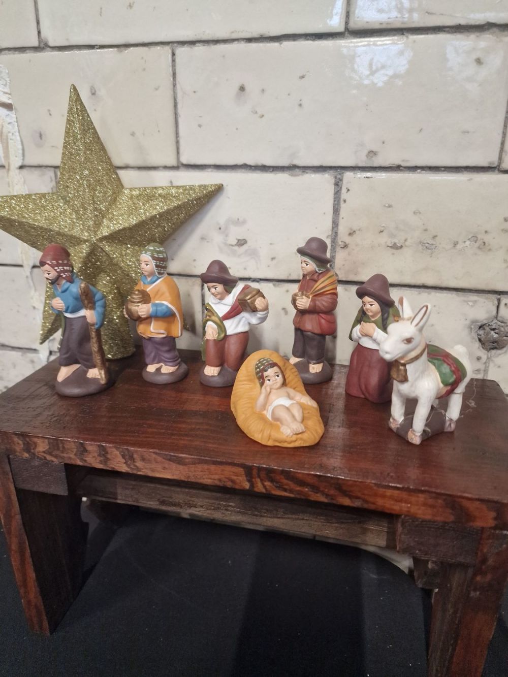 Lot 289: Terracotta hand painted nativity set