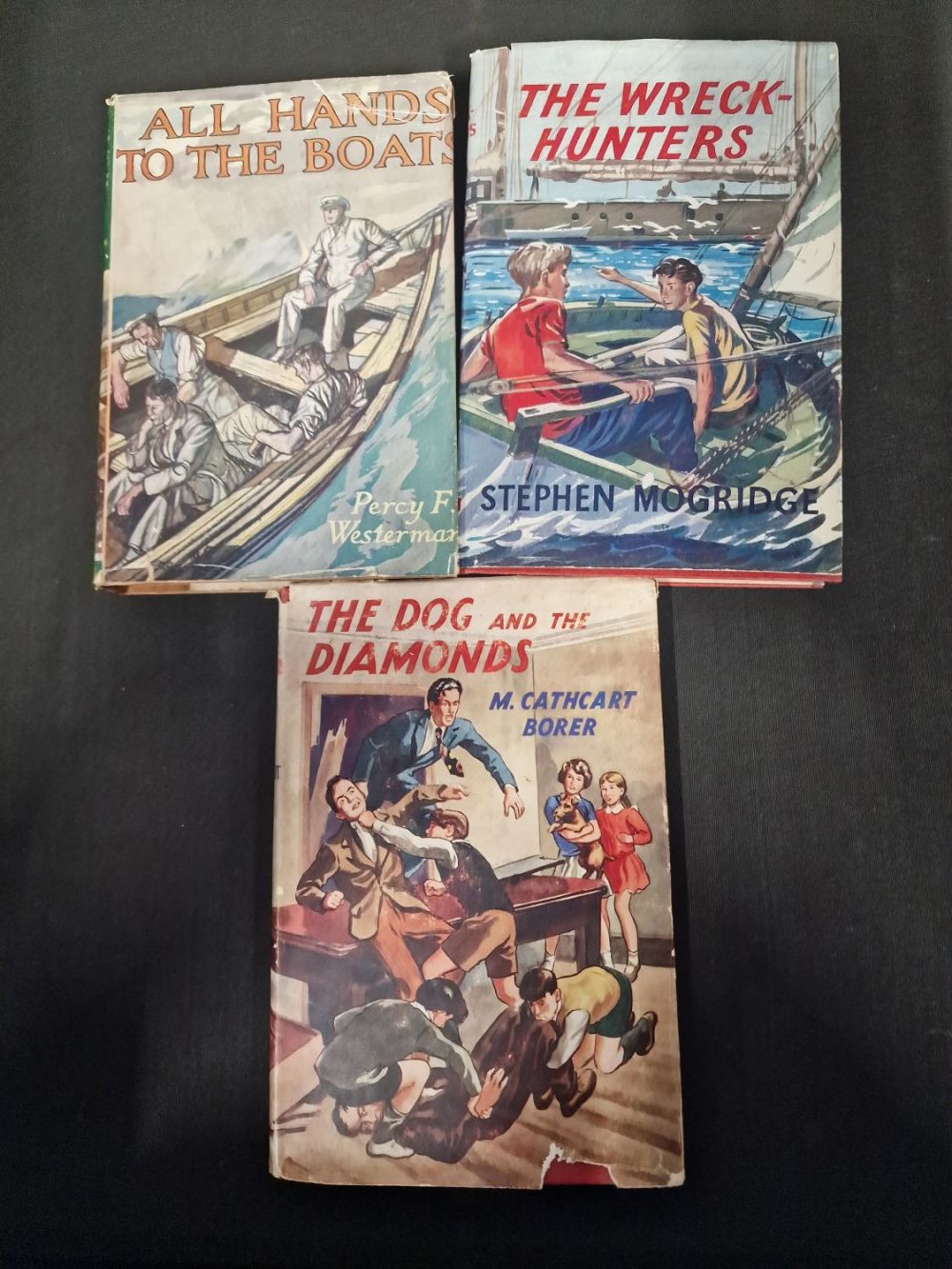 Lot 300: Three collectable vintage books. THE dog and the...