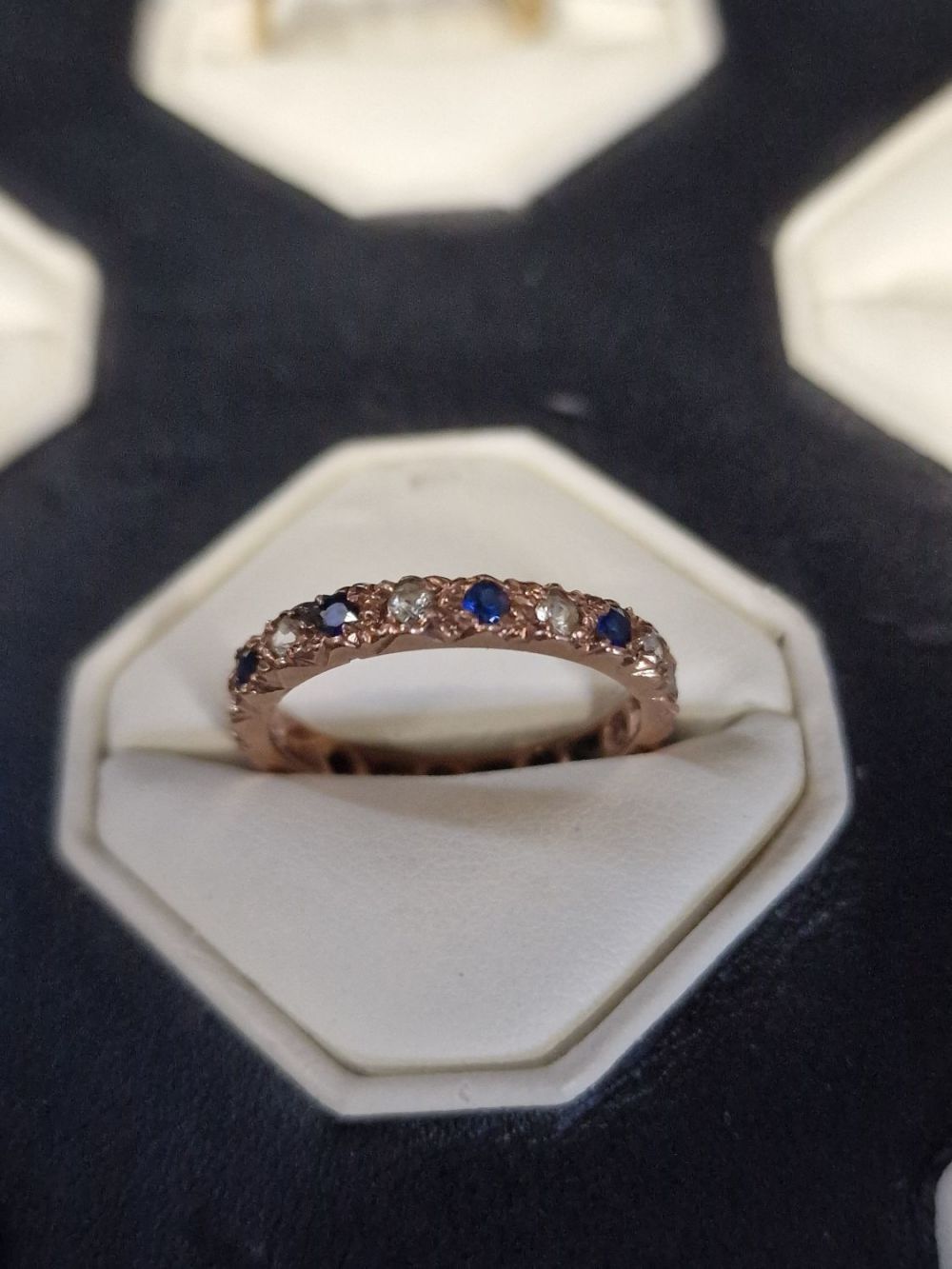Lot 311: 18ct Gold full eternity diamond and sapphire ring....