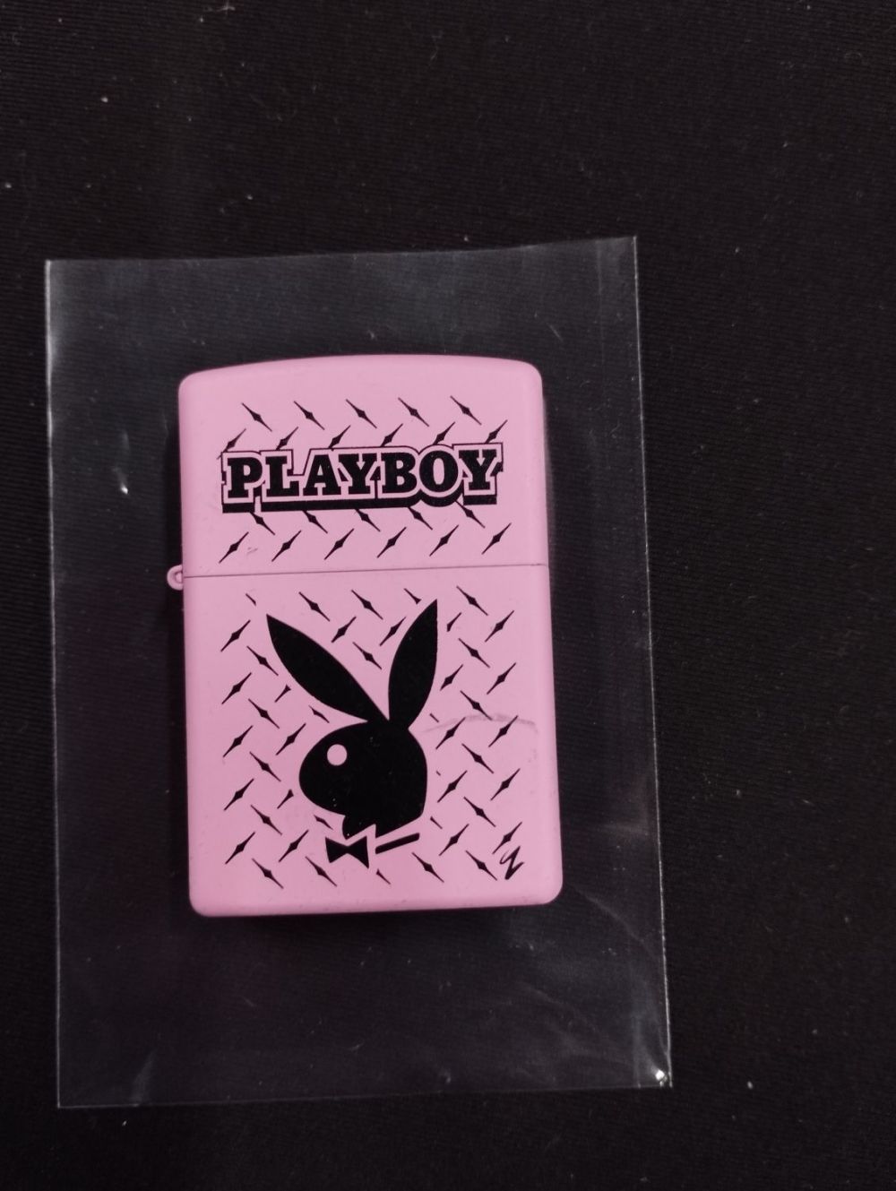 Lot 329: Zippo lighter. Playboy Bunny. New unused
