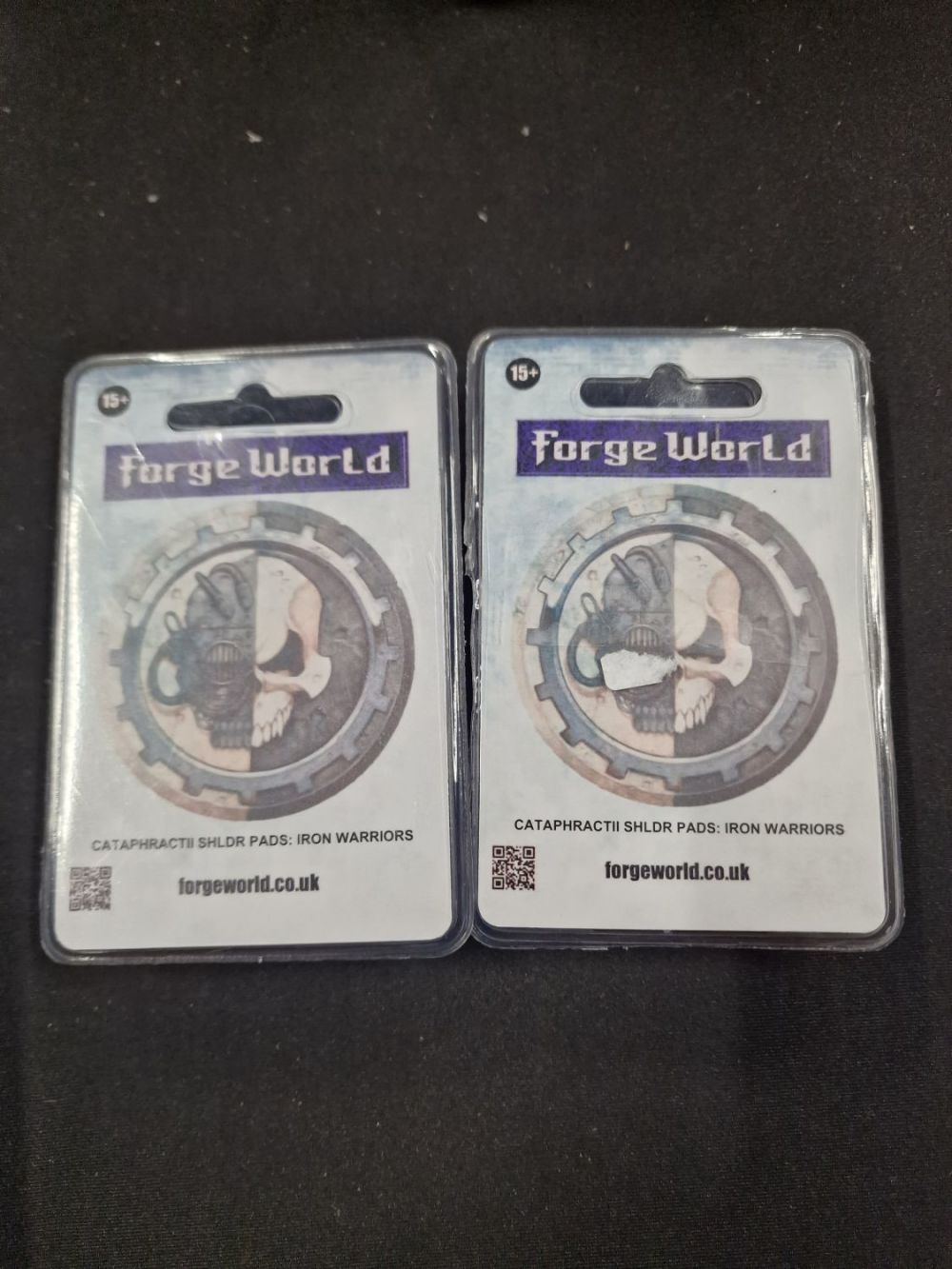 Lot 401: Forge world CataphractII shoulder pads : iron warriors