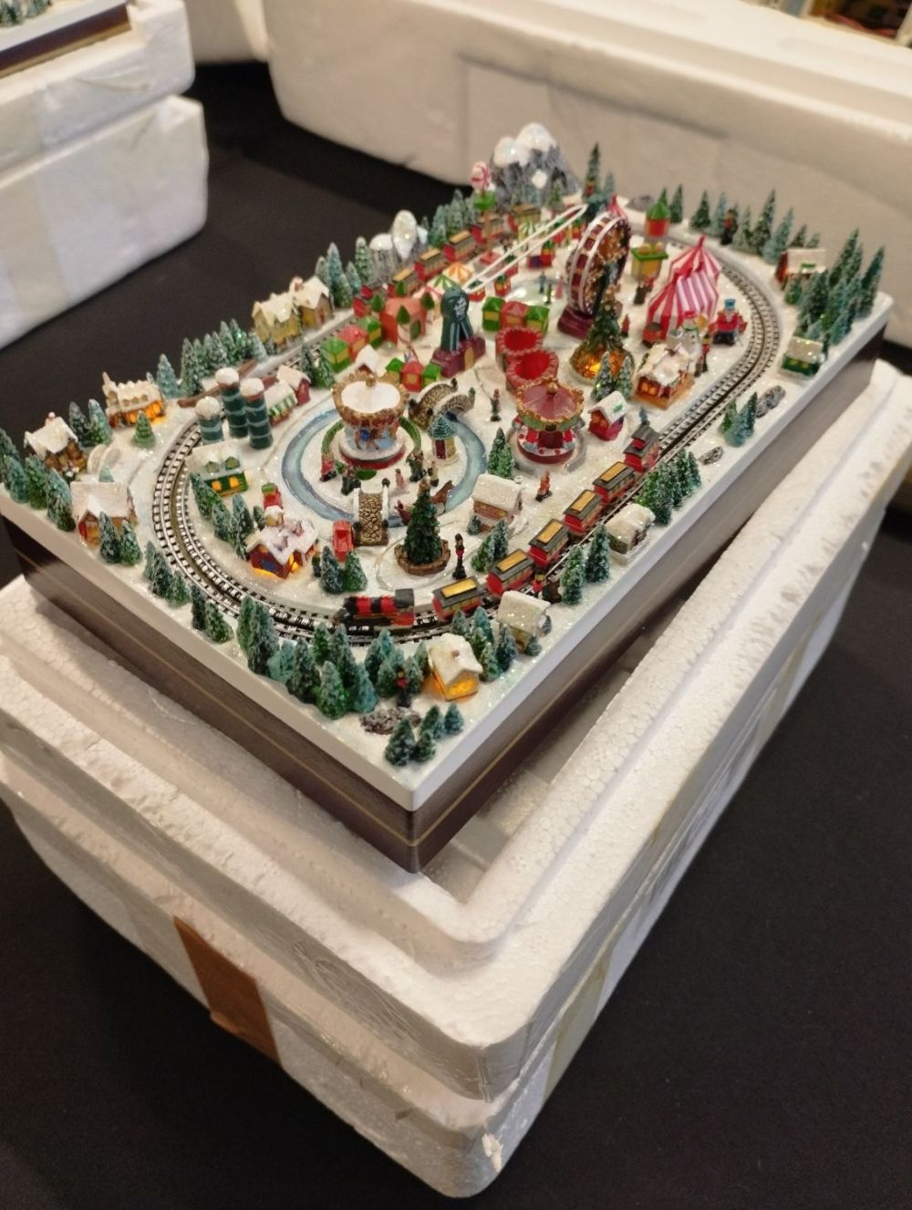 Lot 246: Thomas Kinkade Christmas Village Miniatures "Christmas Carnival" Tested...