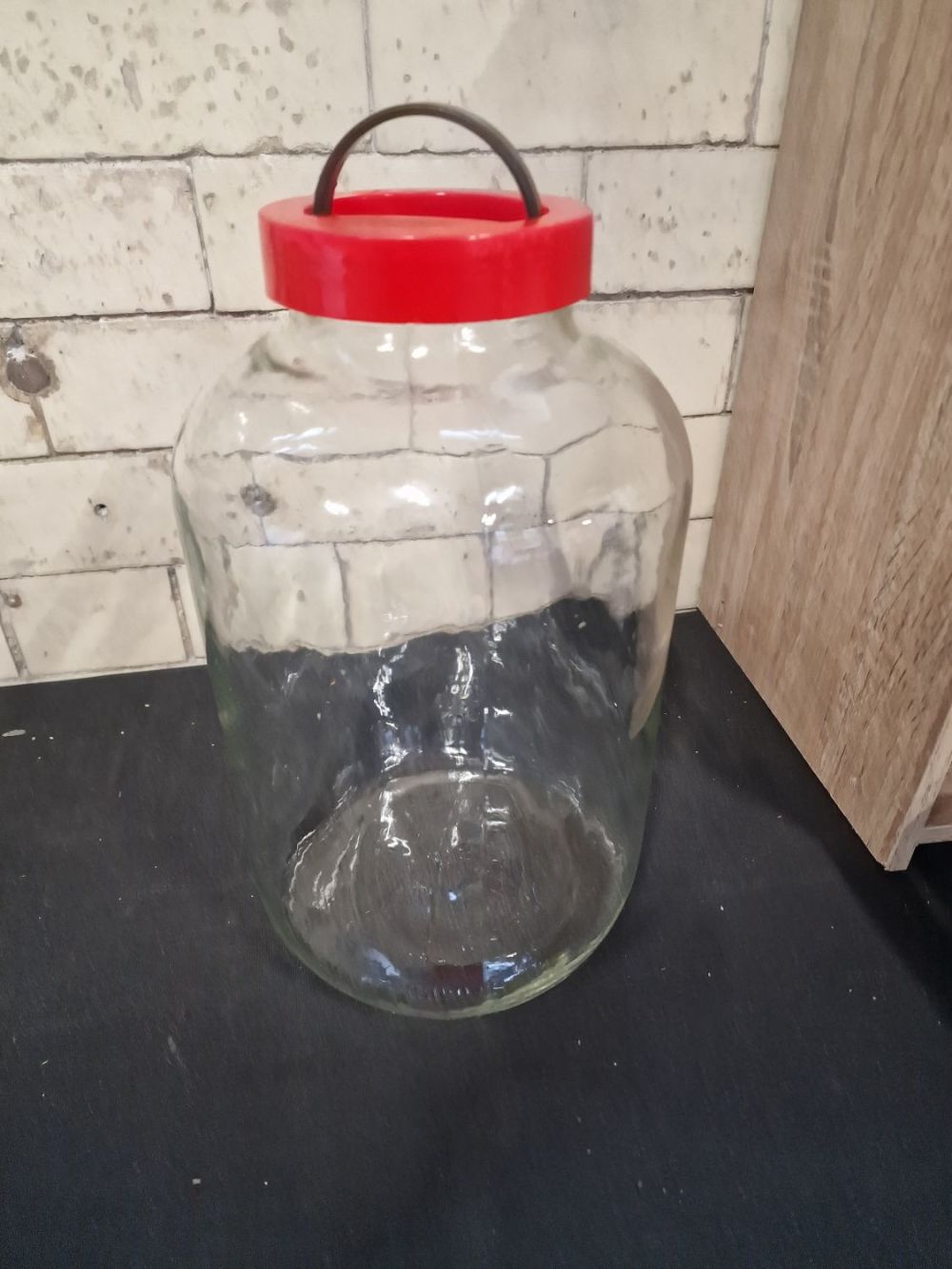 Lot 287: Approximately 4.25 litre storage jar with screen top...