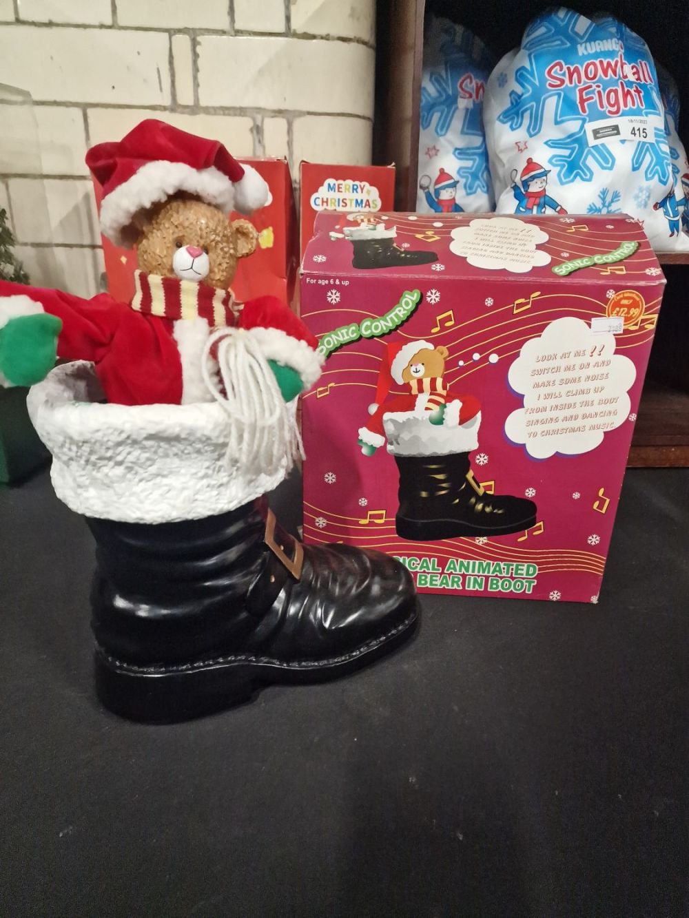 Lot 417: Musical animated Christmas bear in boot.