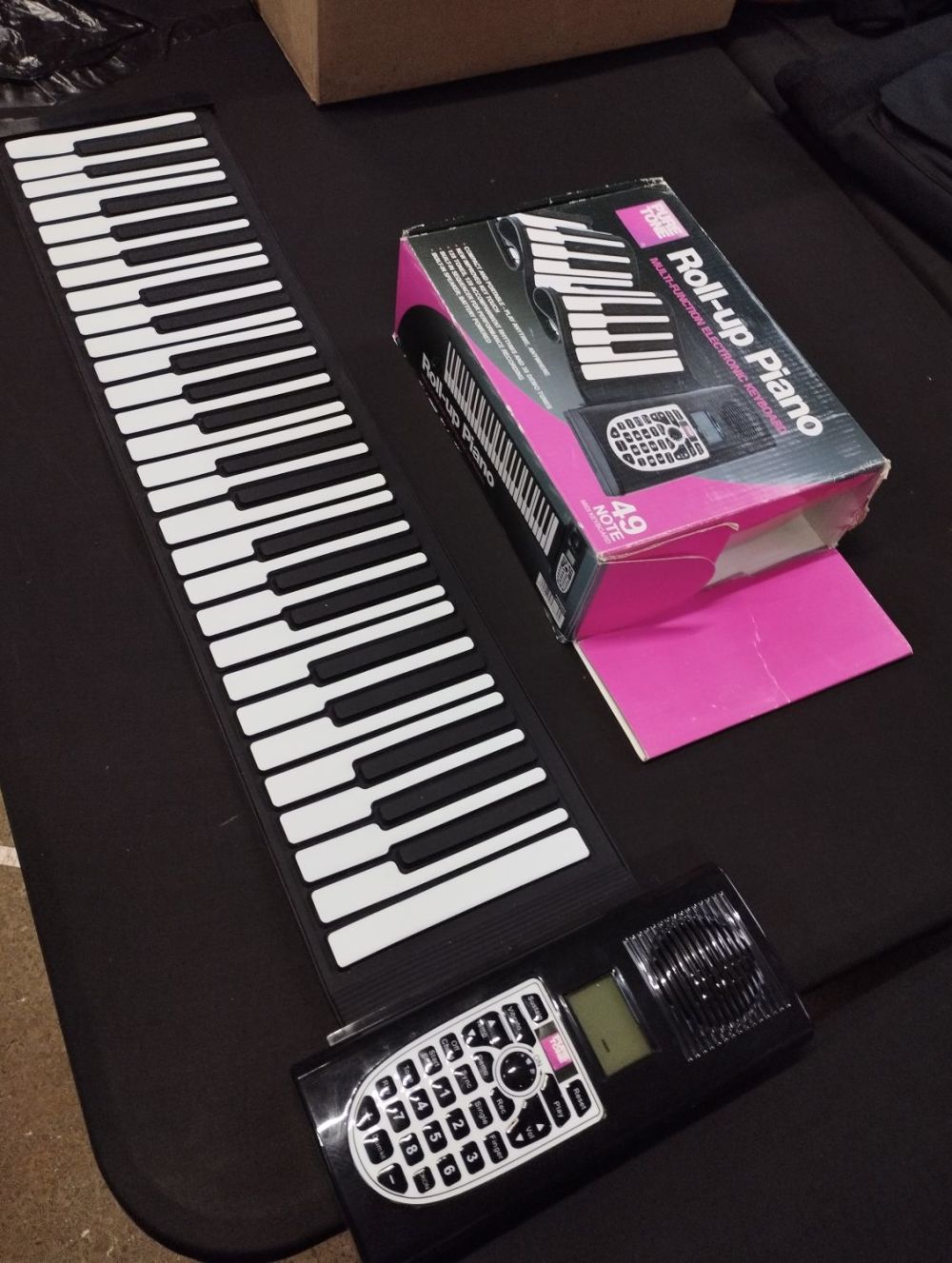 Lot 224: Roll Up Piano Multi Function Electronic Keyboard. Tested...