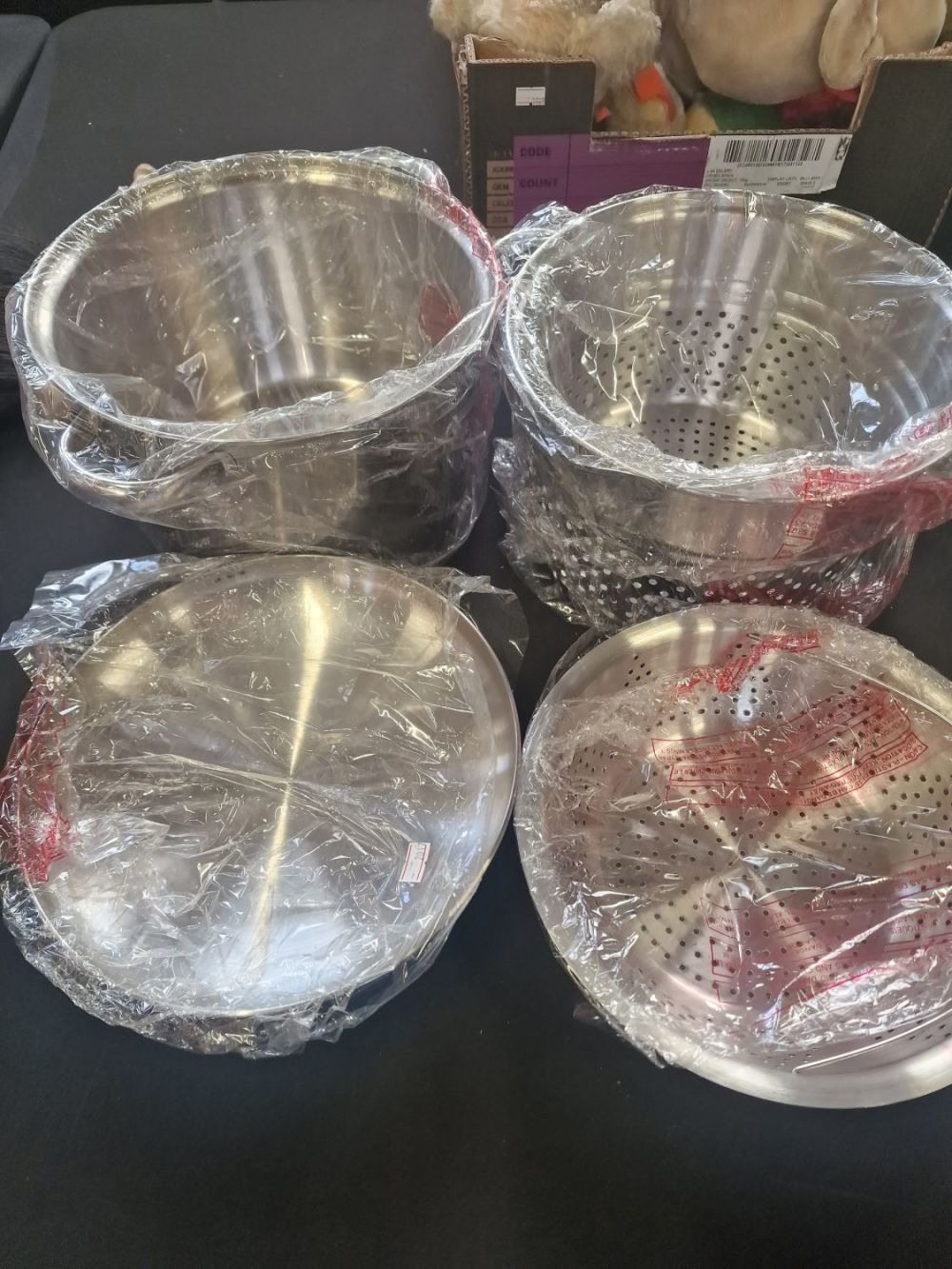 Lot 226: A brqnd new four piece stainless steel multifunctional...