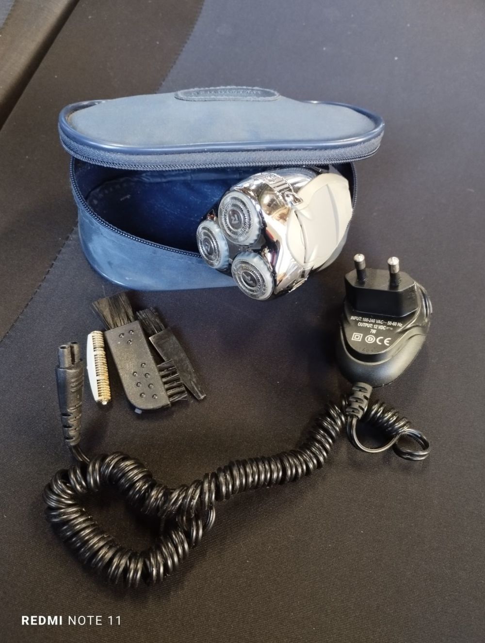 Lot 300: Vintage Remington Electric Razor in Case with Accessories
